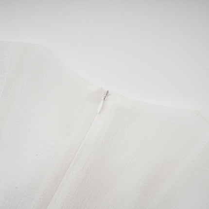 Letizia White Mini Dress with Flared Sleeves and Sheer Button Hem