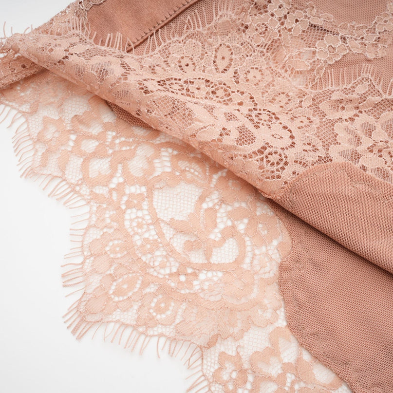 Lexi Pink Lace Mini Dress 100% Polyester Spaghetti Straps Bustier Style Waist-Tightened Design Intricate Lace Hem Modern Muses Statement Piece Opulent Craftsmanship Timeless Style Luxury