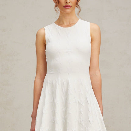 Liana White Star Knit Flared Mini Dress with Cinched Waist and Sleeveless Design