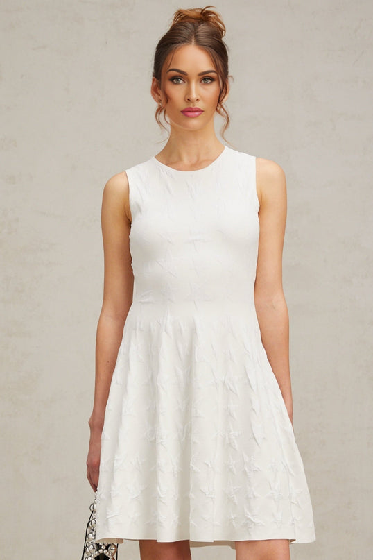 Liana White Star Knit Flared Mini Dress with Cinched Waist and Sleeveless Design