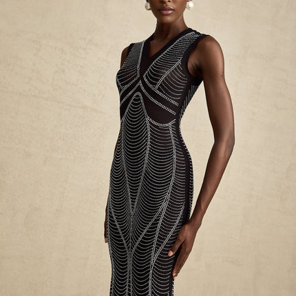 Liane black crystalembellished semisheer maxi dress