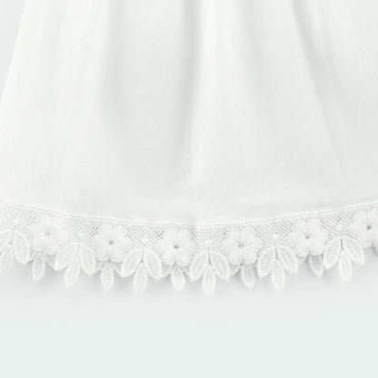 Light colored lace midi dress with floral embroidery details and feminine silhouette