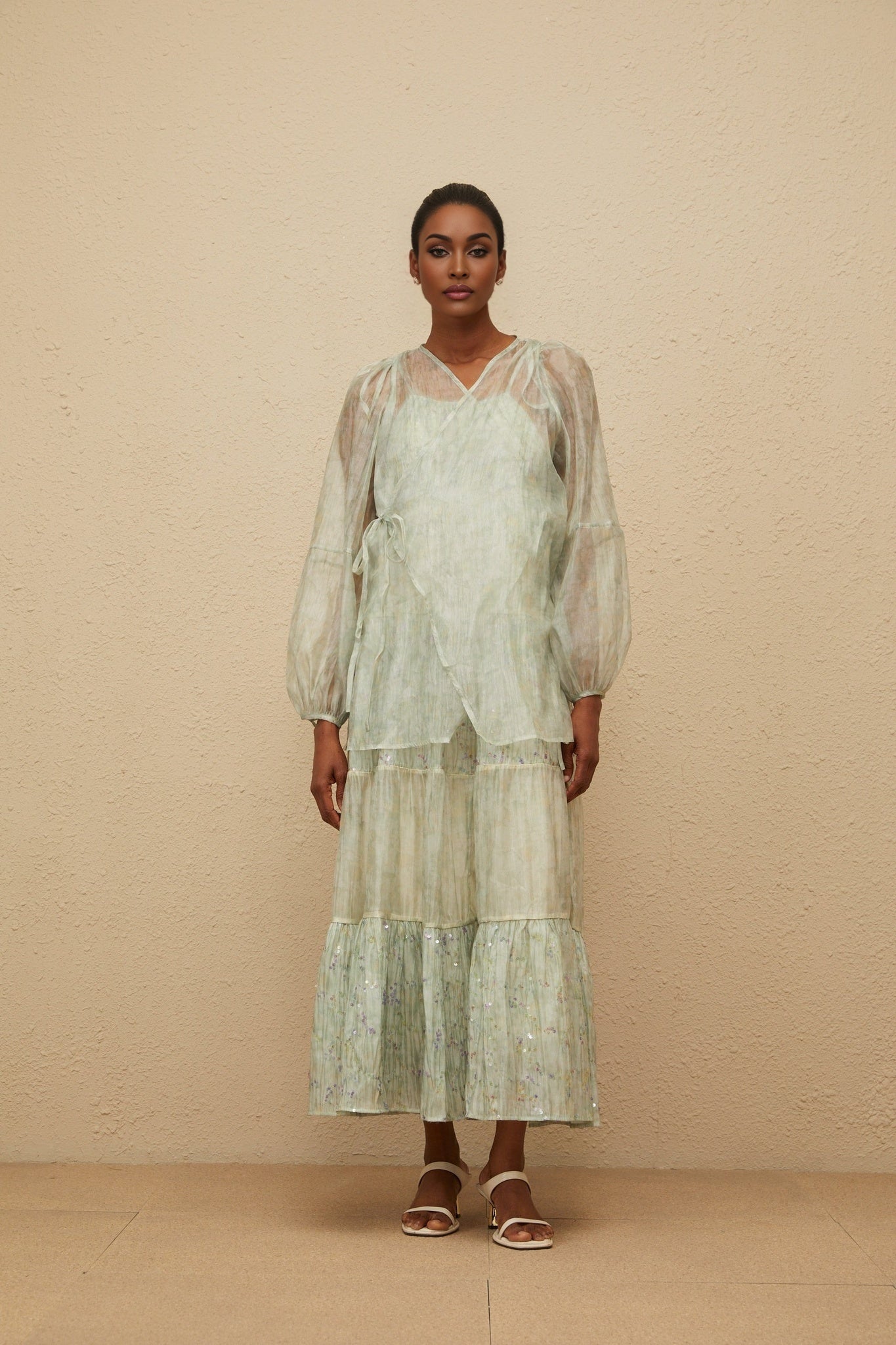Light green V-neck cardigan with tie-dye print and elasticated cuffs