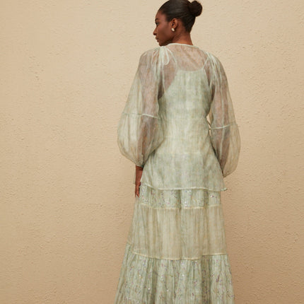 Light green V-neck cardigan with tie-dye print and long puff sleeves