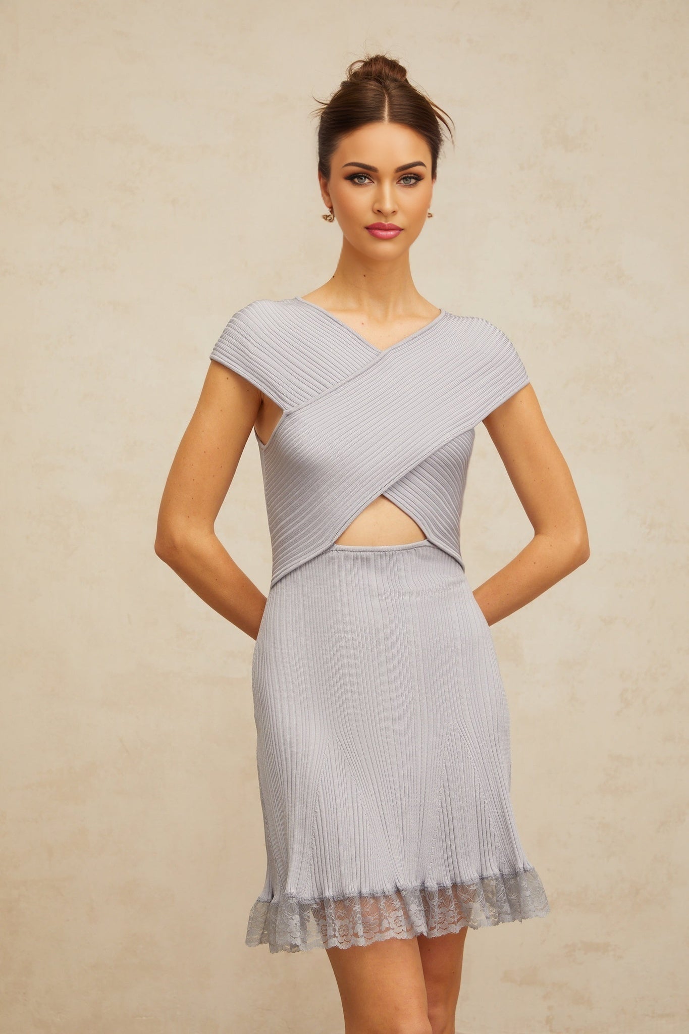 Light purple ribbed knit mini dress with crossover design and short length