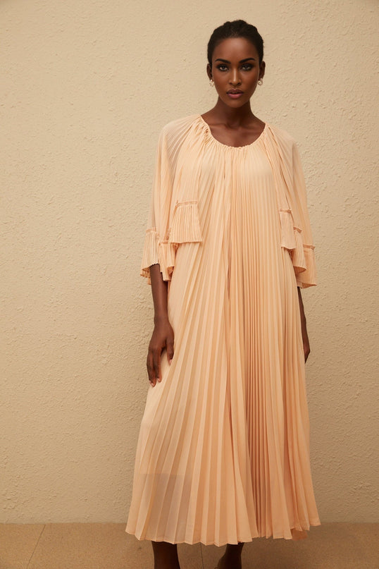 Lilah Midi Dress in Salmon Pink chiffon cape design ruffled detailing scalloped hem pleated silhouette calf-length cut sartorial masterpiece rear zip fastening Terylene fiber sizes fashion enthusiast
