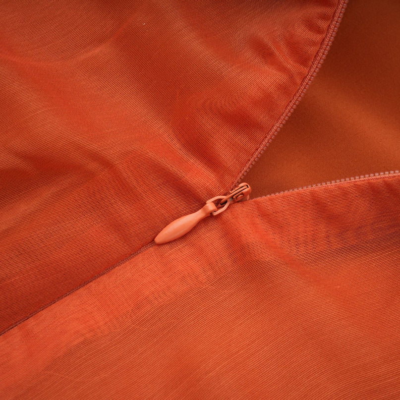 Liliana Maxi Dress in Orange with Halterneck Design and Floral Appliqué