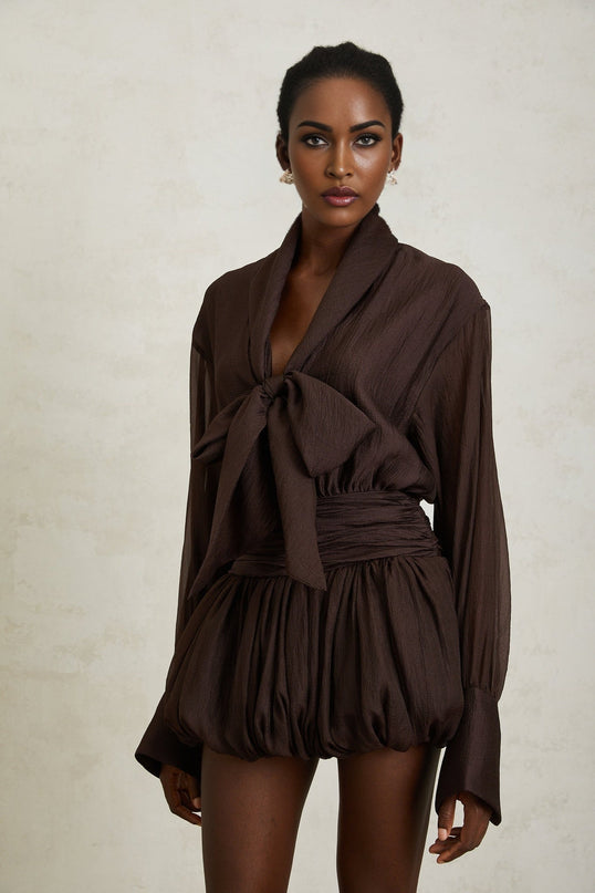 Lina Mini Dress in Brown with long sleeves, cinched waist, and ruched detailing