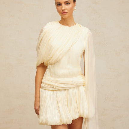 Lina Mini Dress in Neutrals pleated design with ribbon detailing and glitter accents