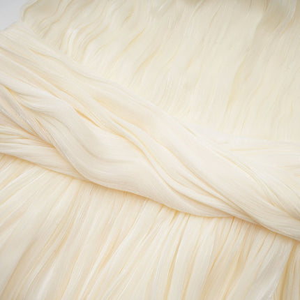 Lina Mini Dress in Neutrals pleated design with ribbon detailing and glitter accents asymmetrical silhouette cinched waist and bubble hem round neck and twist detailing rear zip fastening made from luxurious blend of Terylene fiber Viscose and Spandex