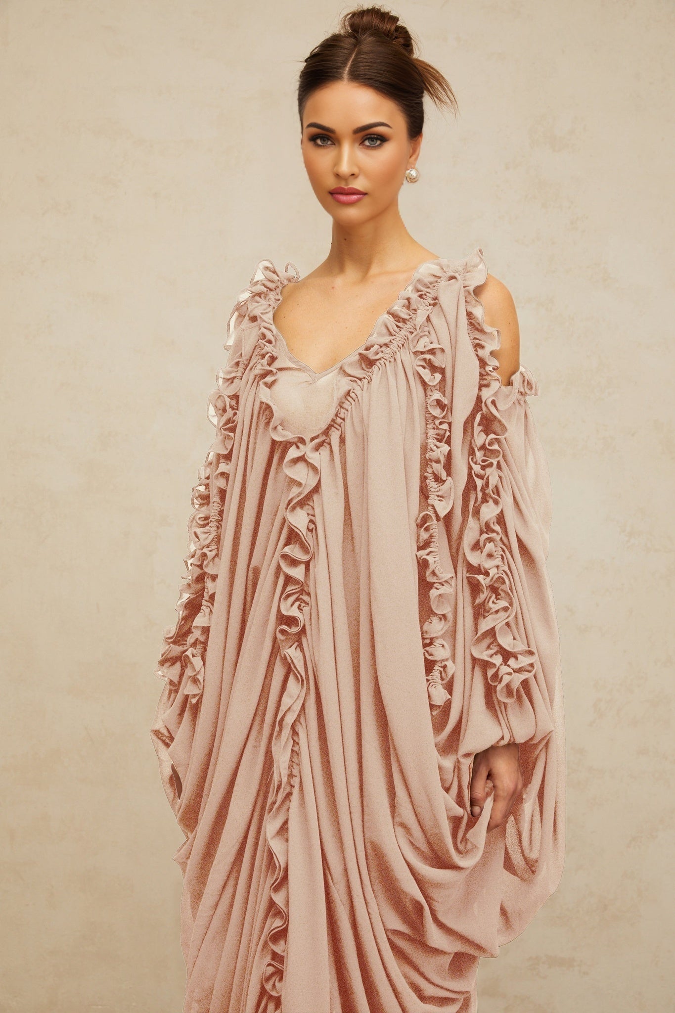 Long flowy tulle maxi dress with ruffled trim details and delicate feminine design