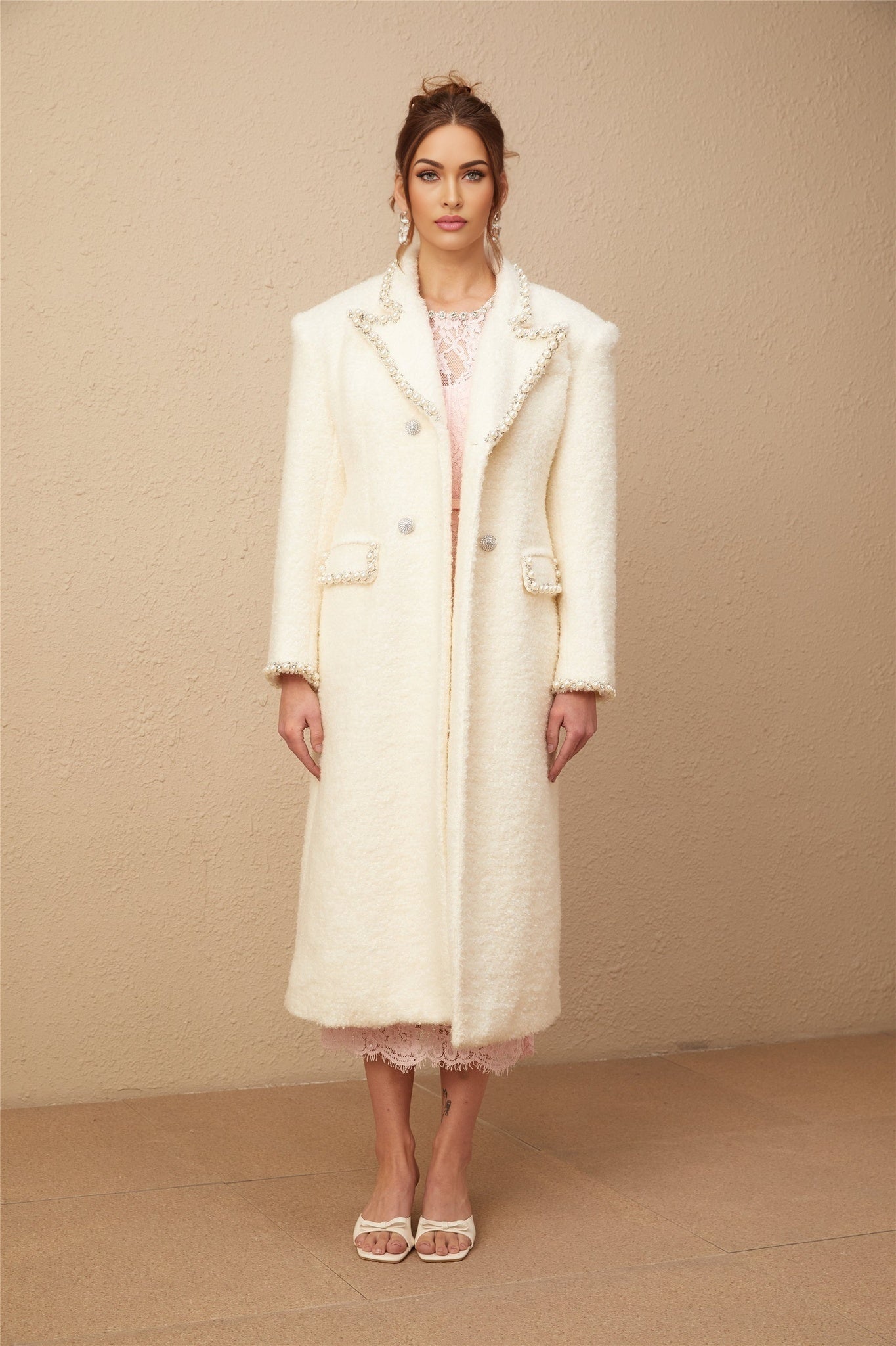 Long tweed coat made of Isotta wool featuring faux pearl embellishments
