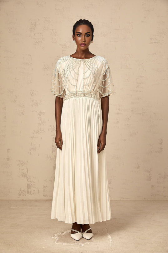 Long white pleated maxi dress with crystal embellishments