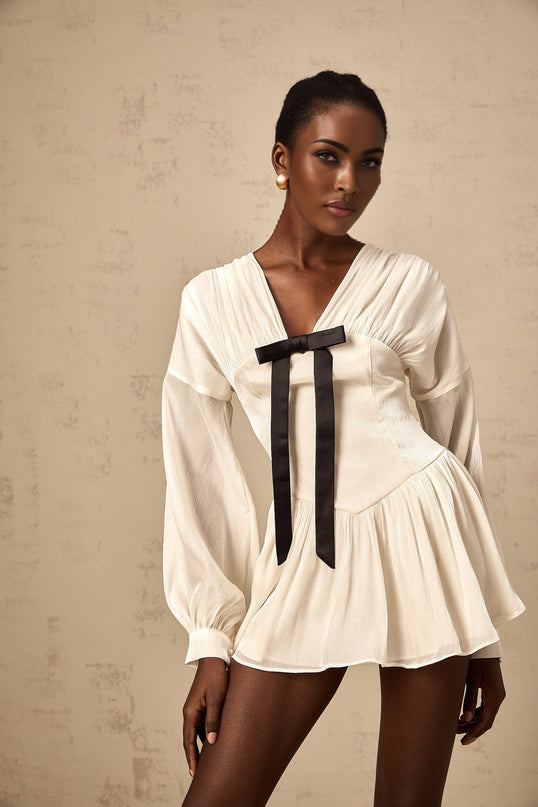 Lorelei White Glitter Bow V-Neck Mini Dress with Puff Sleeves and Pleated Design