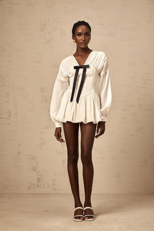 Lorelei White Glitter Bow Mini Dress V-Neck Puff Sleeves Cinched Waist Pleated Design Rear Zip Tie Fastening Thigh Length 52% Polyester 48% Viscose