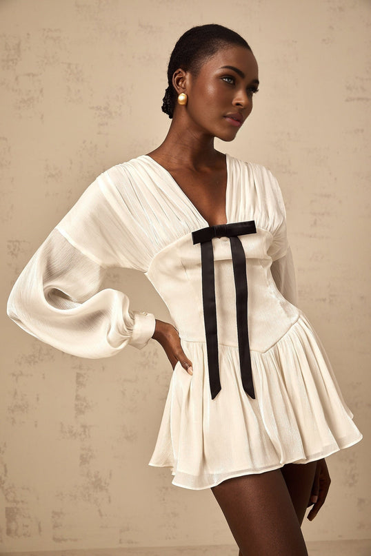 Lorelei White Glitter Bow V-Neck Mini Dress with Puff Sleeves and Pleated Design