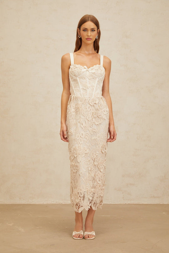 Lucille Midi Dress in Neutrals corset design lace bow sweetheart neckline adjustable wide straps boned bodice built-in cups cinched waist corded lace bow embellishment rear slit zip fastening midi-length luxury special event