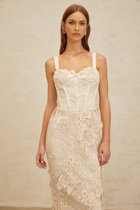 Lucille Midi Dress in Neutrals corset design lace bow sweetheart neckline adjustable wide straps boned bodice built-in cups cinched waist corded lace bow embellishment rear slit zip fastening midi-length luxury special event