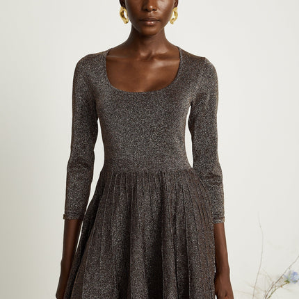 Lucrezia Mini Dress in Barley Brown ribbed knit with metallic threading scoop neck long sleeves fitted waistline flare hem rear press-stud fastening thigh-length 64% Polyester 36% Metallic Fiber