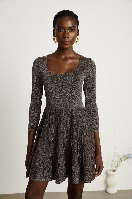 Lucrezia Mini Dress in Barley Brown ribbed knit with metallic threading scoop neck long sleeves fitted waistline flare hem rear press-stud fastening thigh-length 64% Polyester 36% Metallic Fiber