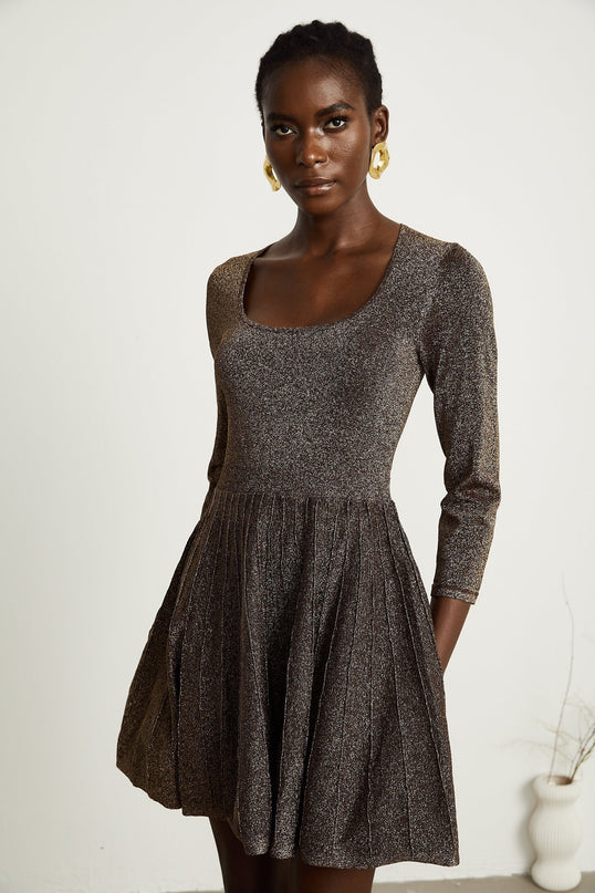 Lucrezia Mini Dress in Barley Brown ribbed knit with metallic threading scoop neck long sleeves fitted waistline flare hem rear press-stud fastening thigh-length 64% Polyester 36% Metallic Fiber