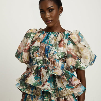 Lylah Floral Tiered Midi Dress in Neutrals Multicolor Linen Fabric Short Puff Sleeves Rear Zip Fastening Size M Model 5'10 Elegant Versatile Upscale Occasion