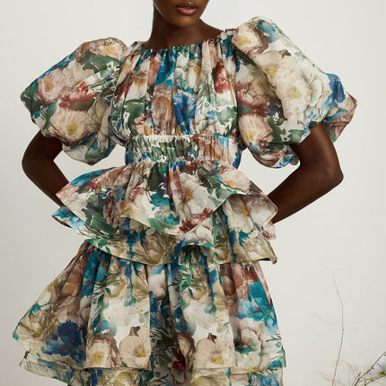 Lylah Floral Tiered Midi Dress Neutrals Multicolor Linen Fabric Puff Sleeves Size M Model 5'10 Elegant Chic Sophisticated Rear Zip Fastening Versatile Upscale Occasion