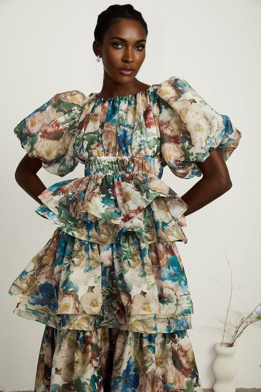 Lylah Floral Tiered Midi Dress Neutrals Multicolor Linen Fabric Puff Sleeves Size M Model 5'10 Elegant Chic Sophisticated Rear Zip Fastening Versatile Upscale Occasion