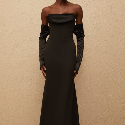 Mackenzie Maxi Dress in Black off-shoulder corset-style bodice slit cuffs flared hem boned bodice rear zip fastening special occasions femininity refinement