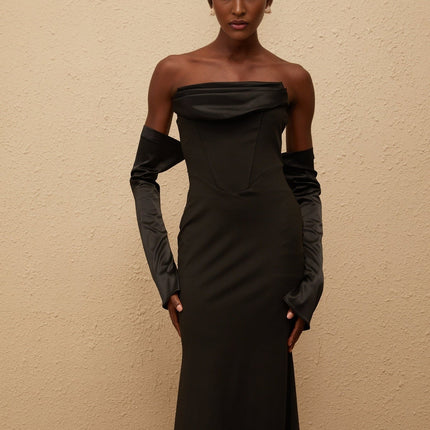 Mackenzie Maxi Dress in Black with off-shoulder design and corset-style bodice, crafted from 100% Terylene fiber