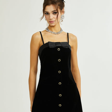 Madalynn Black Mini Dress with Bow Detailing and Front Button Accent