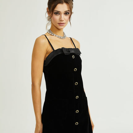 Madalynn Black Mini Dress with Bow Detailing and Front Button Accent