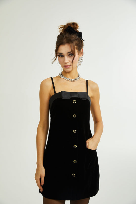 Madalynn Black Mini Dress with Bow Detailing and Front Button Accent