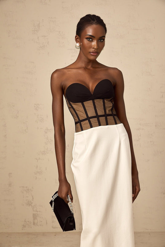 Madelyn Black Strapless Maxi Dress with Sweetheart neckline and Corset styling, crafted from luxurious fabrics with Contrast colors and Rear slit