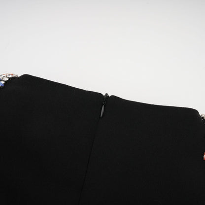 Maëlys black crystalembellished midi dress