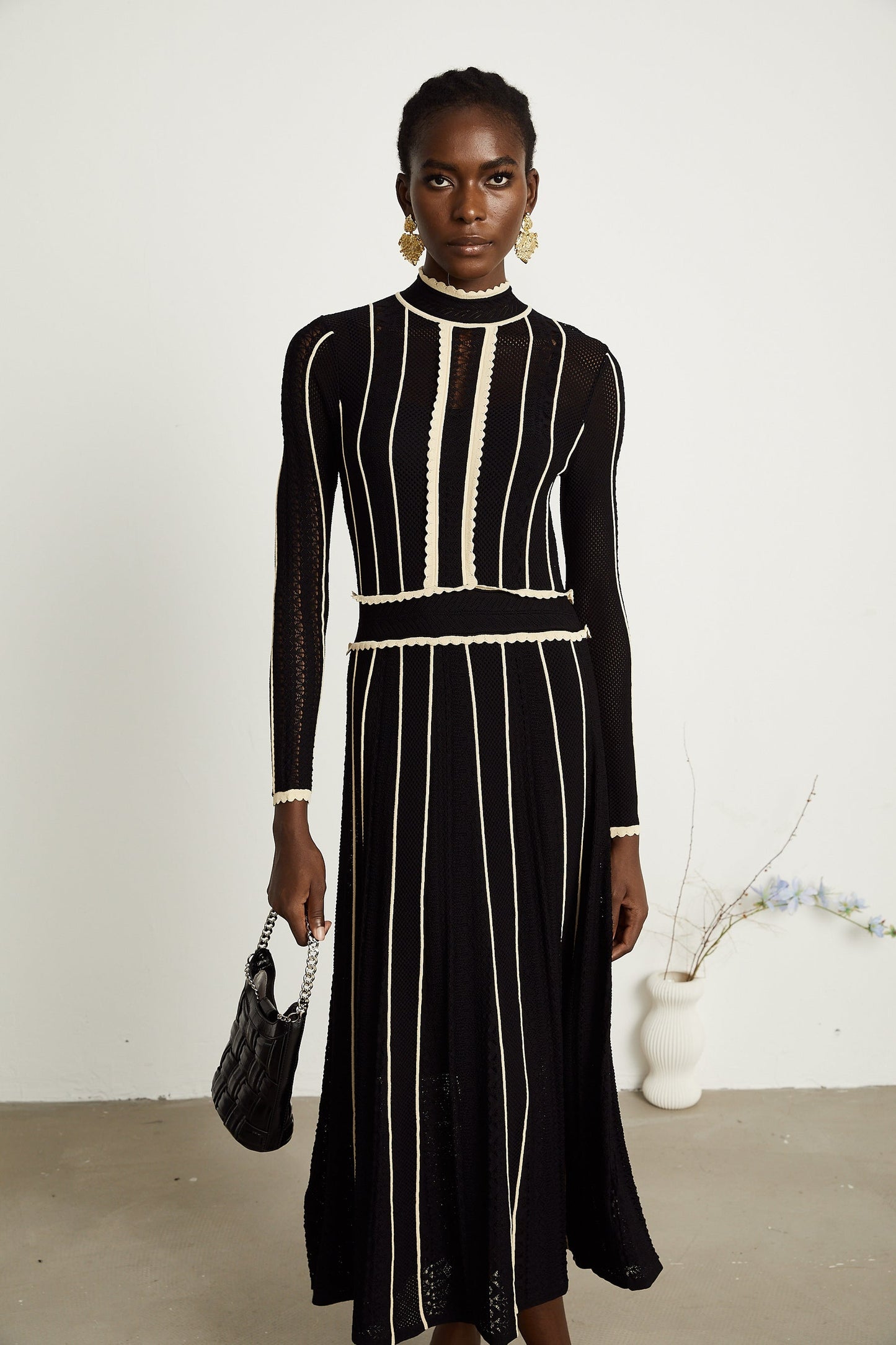 Maëlys black verticalstripe netted maxi dress