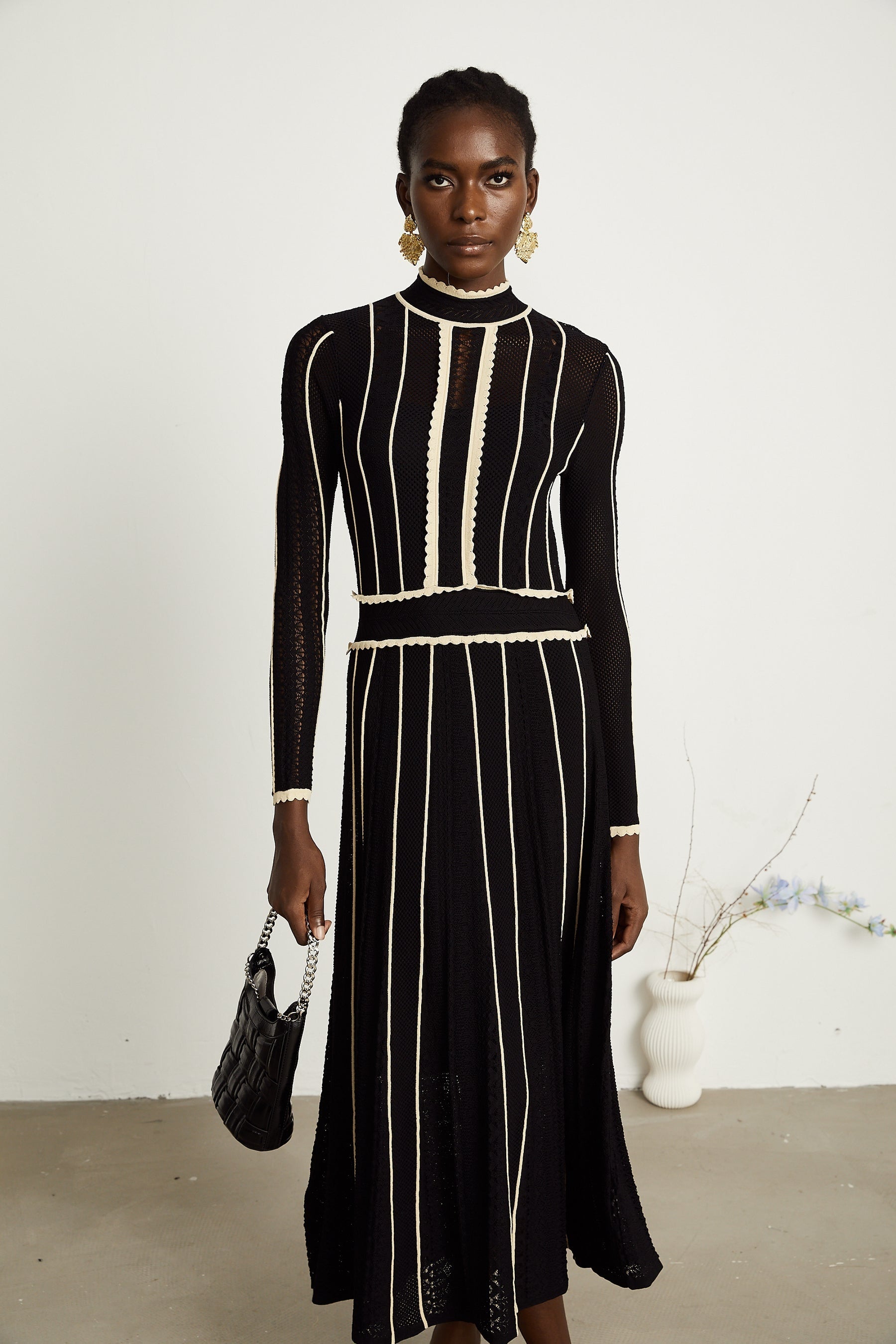 Maëlys black verticalstripe netted maxi dress