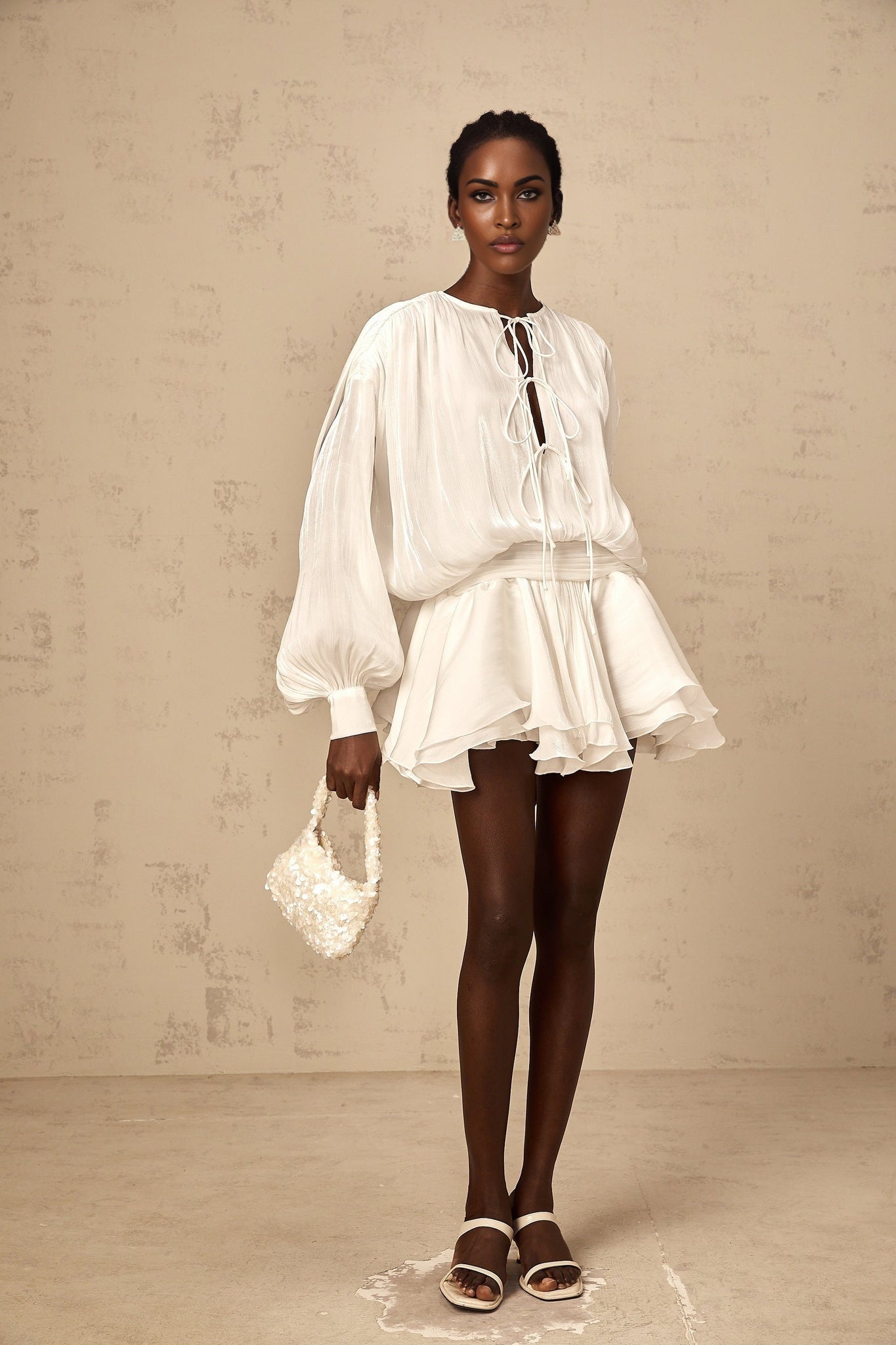 Mahault white pleated glittereffect mini dress