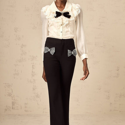 Margherita Black Studded Bow Ankle-Length Trousers with Flared Hem and Front Patch Pockets