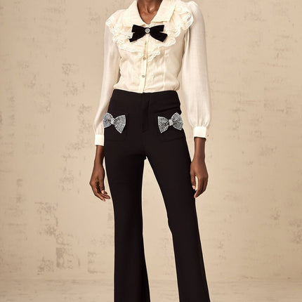 Margherita Black Studded Bow Ankle-Length Trousers with Flared Hem and Front Pockets
