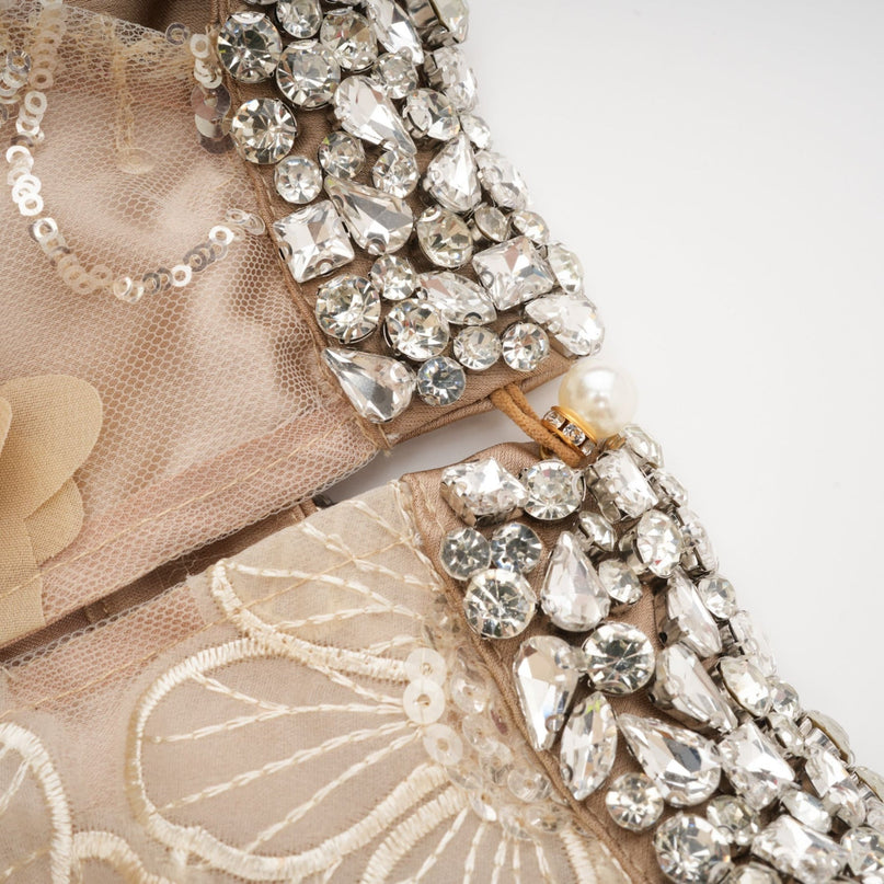 Margherita Mini Dress in Neutrals floral appliqué crystal embellishments sleeveless layered design mini length round neck rear button fastening 100% polyester elegance sophistication glamour grace charm luxury versatile upscale occasion timeless exquisite creation