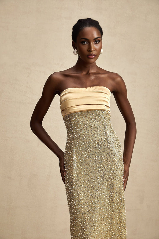 Marguerite Gold Sequin Maxi Dress faux pearl embellishments pleated bodice back slit zipper closure full-length silhouette polyester fiber elegant sophisticated special occasions