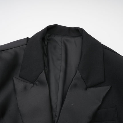 Mariangela Black Oversize Bow Tie Blazer with Peak Lapels and Cut-Out Design