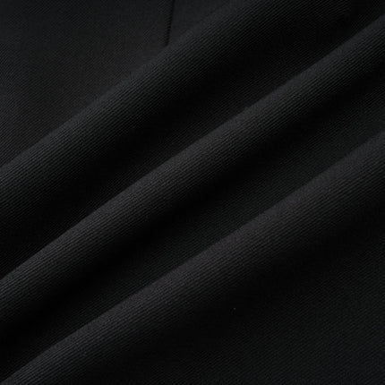 Mariangela Black Oversize Bow Tie Blazer with Peak Lapels and Cut-Out Design