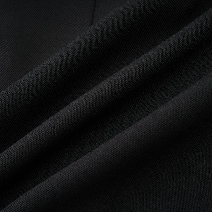 Mariangela Black Oversize Bow Tie Blazer with Peak Lapels and Cut-Out Design