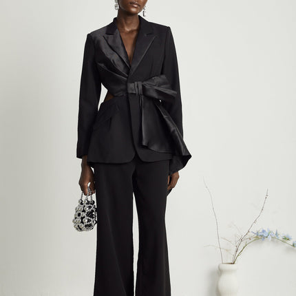 Mariangela Black Oversize Bow Tie Blazer with Peak Lapels and Cut-Out Design