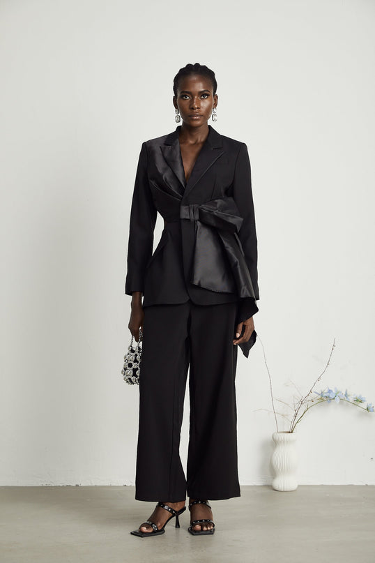 Mariangela Black Oversize Bow Tie Blazer with Peak Lapels and Cut-Out Design