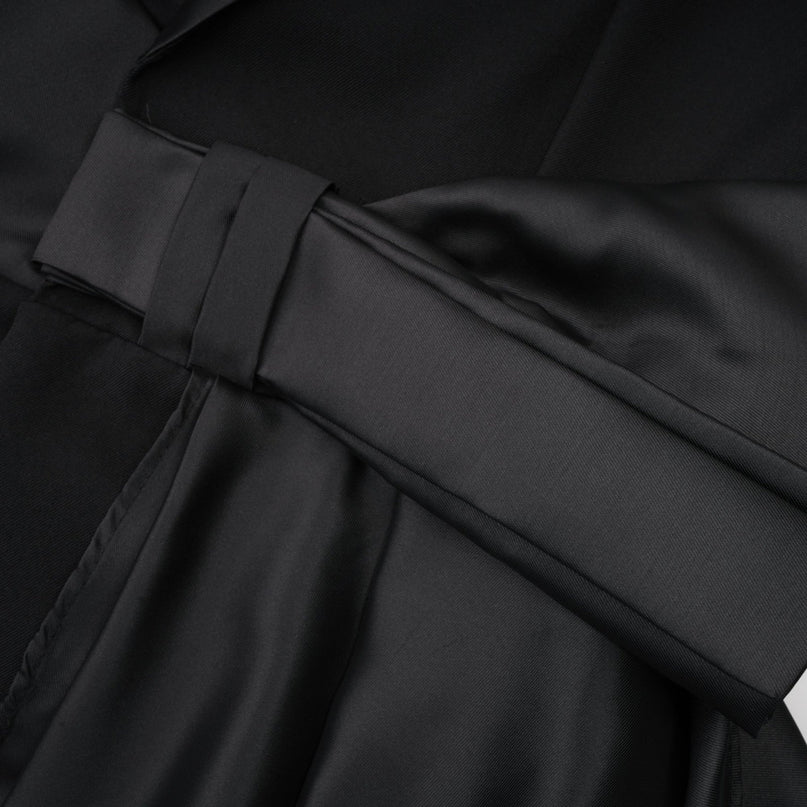 Mariangela Black Oversize Bow Tie Blazer with peak lapels and cut-out design