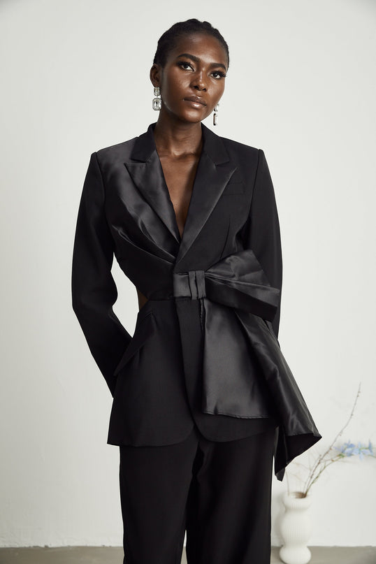 Mariangela Black Oversize Bow Tie Blazer with Peak Lapels and Cut-Out Design