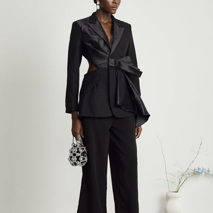 Mariangela Black Oversize Bow Tie Blazer with Peak Lapels and Cut-Out Design